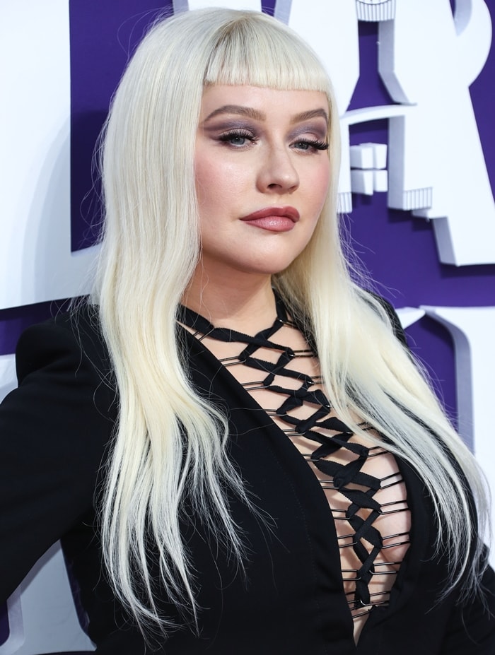 Christina Aguilera wore a revealing lace-up dress from Tom Ford