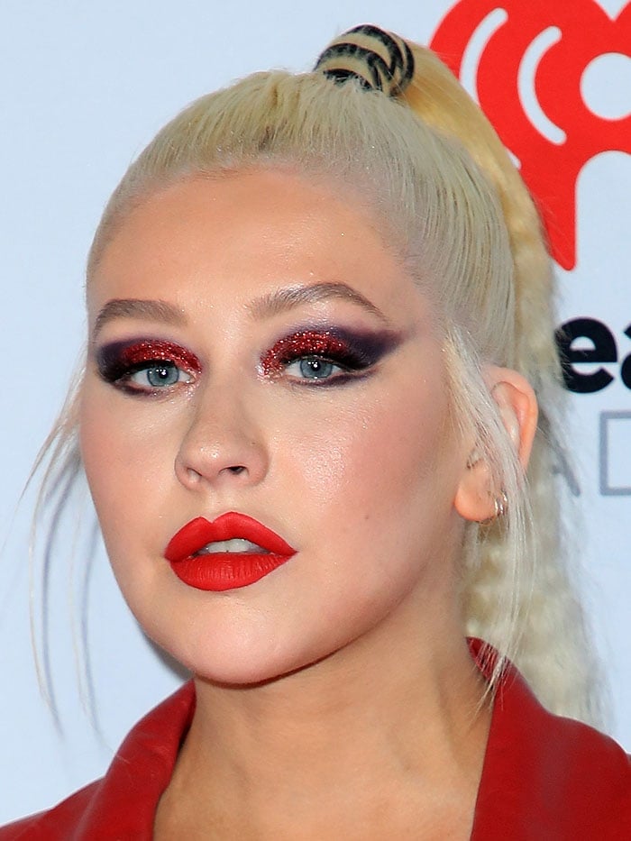 Christina Aguilera's glittery red eyeshadow and red lipstick