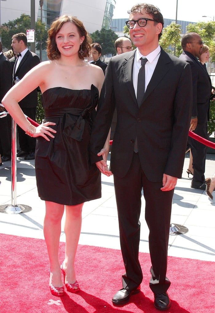 Actors Elisabeth Moss and Fred Armisen arrive at the 61st Primetime Emmy Awards