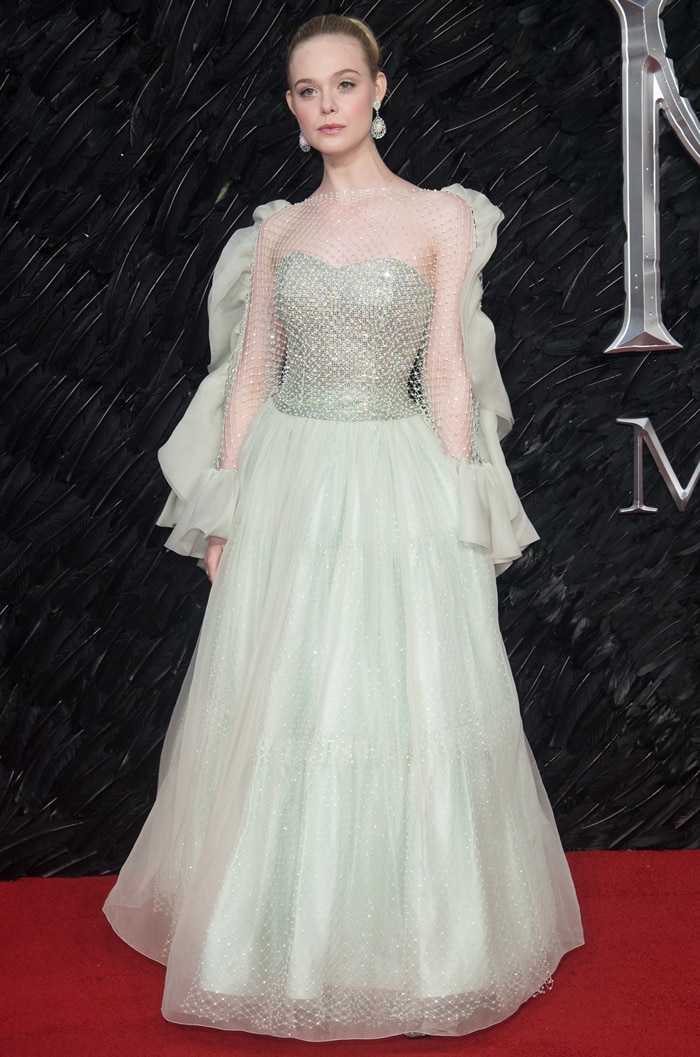 Elle Fanning looked like a Disney princess in a light green Armani Privè gown with a strapless crystal-embellished top