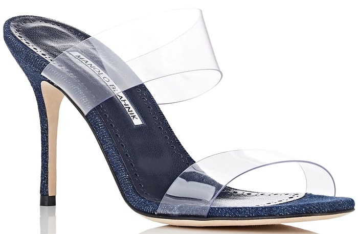 Manolo Blahnik's Scolto mules are styled with double clear PVC bands and a slim stiletto heel