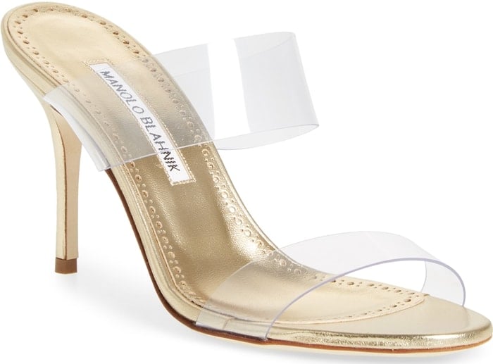 Manolo Blahnik's Scolto mules are styled with double clear PVC bands and a slim stiletto heel