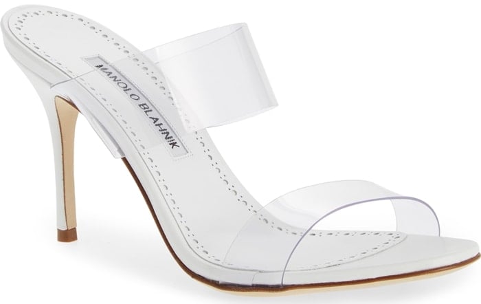 Manolo Blahnik's Scolto mules are styled with double clear PVC bands and a slim stiletto heel