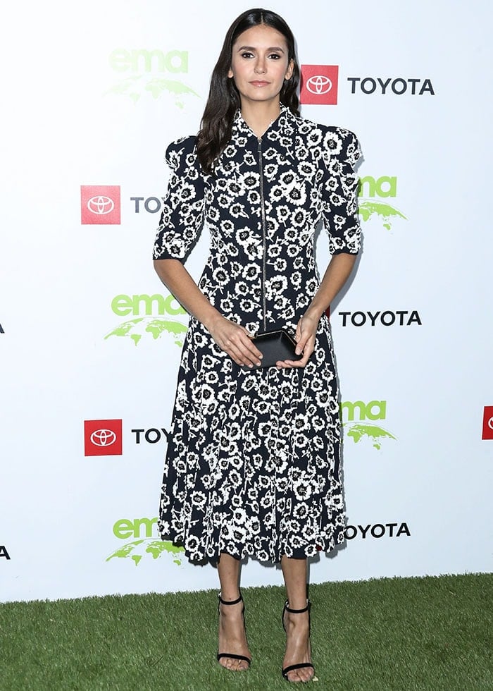 Nina Dobrev wearing a zip-up front daisy-embroidered midi dress from Michael Kors Resort 2020 Collection