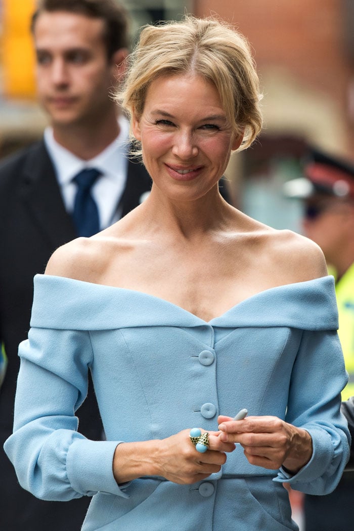 Renée Zellweger's Ulyana Sergeenko powder-blue off-shoulder dress showing off her sharp collarbones