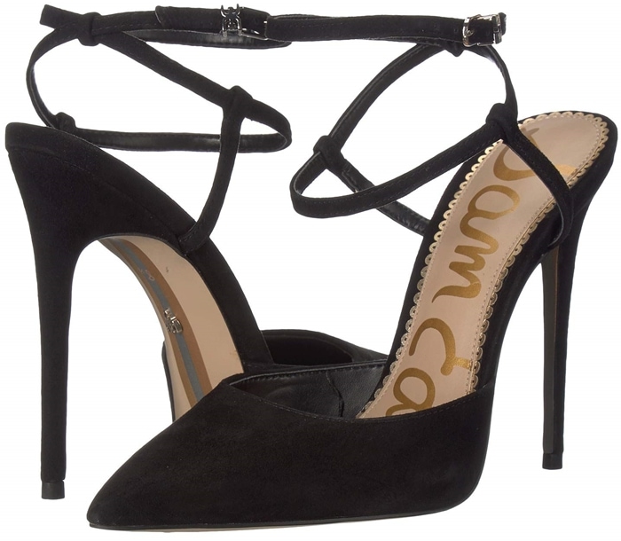 A fiercely stylish pump with a pointy toe and slim ankle strap that criss-crosses at the back is finished with a logo buckle and willowy stiletto heel