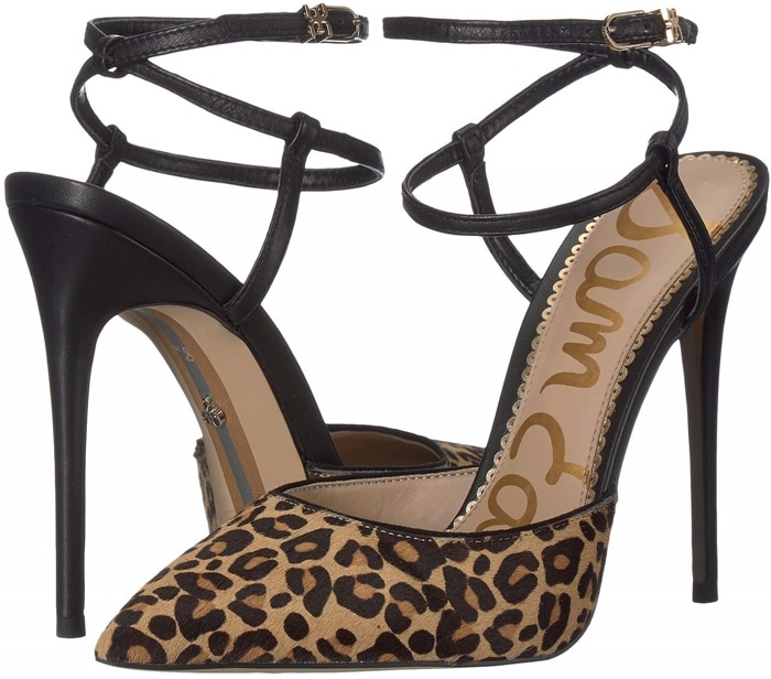 A fiercely stylish pump with a pointy toe and slim ankle strap that criss-crosses at the back is finished with a logo buckle and willowy stiletto heel