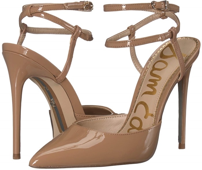 A fiercely stylish pump with a pointy toe and slim ankle strap that criss-crosses at the back is finished with a logo buckle and willowy stiletto heel