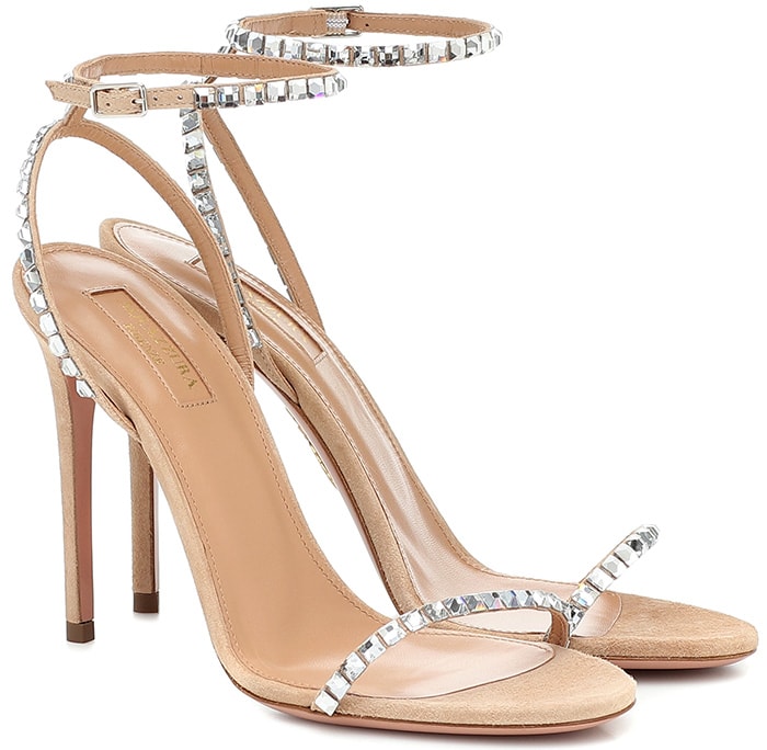 In a barely-there strappy silhouette, these nude suede sandals are accented with sparkling crystal trim