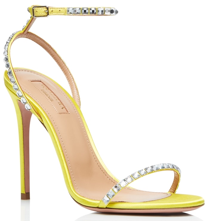 In a barely-there strappy silhouette, these yellow suede sandals are accented with sparkling crystal trim