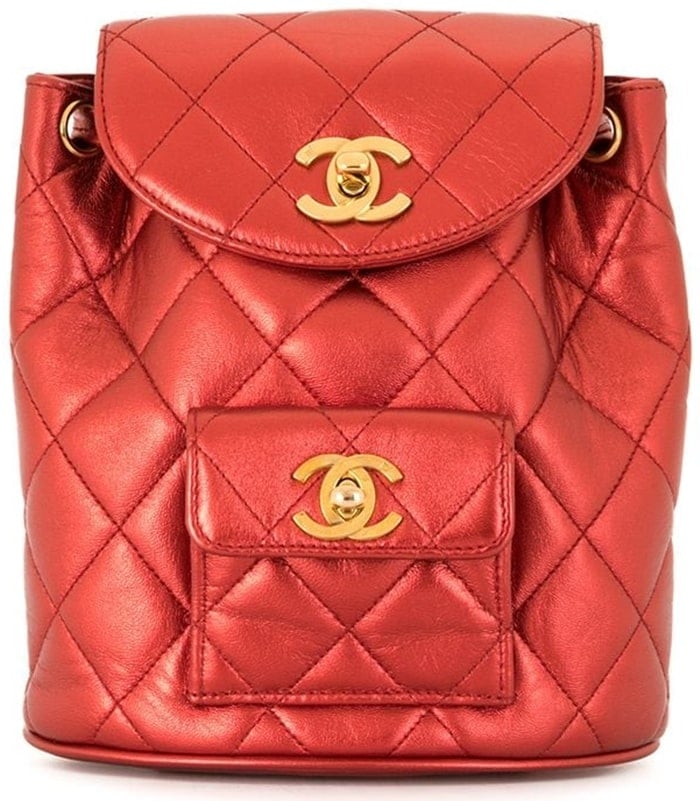 This backpack from Chanel comes in sleek red leather and fastens with an interlocking CC twist lock