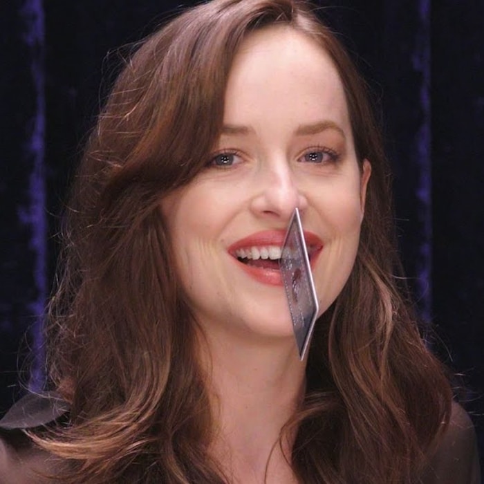 Dakota Johnson could fit a credit card between her two front teeth