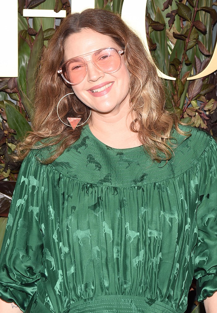 Drew Barrymore wears barely-there makeup with rose gold aviators