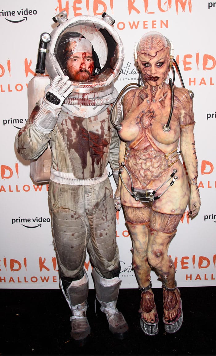 Tom Kaulitz as a bloodied astronaut who was attacked and killed by alien Heidi Klum