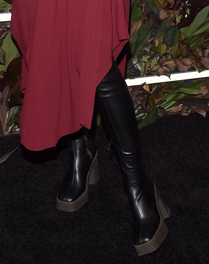 Hilary Rhoda teams her dress with Stella McCartney over-the-knee boots