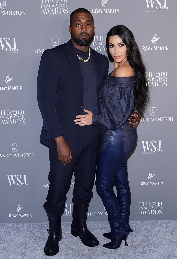 Kim Kardashian showcases incredible curves in blue chaps 