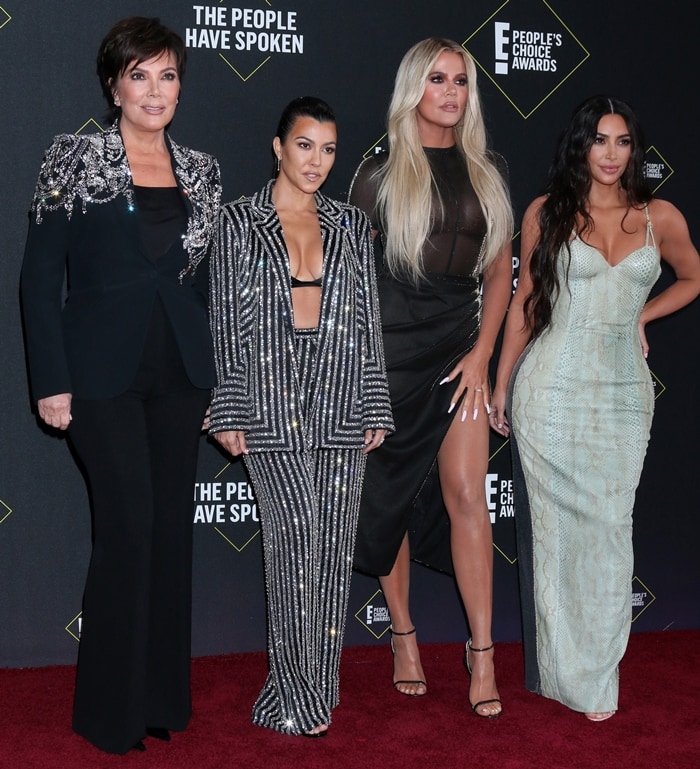 Kim, Kourtney, and Khloe Kardashian along with mom Kris Jenner at the 2019 E! People’s Choice Awards