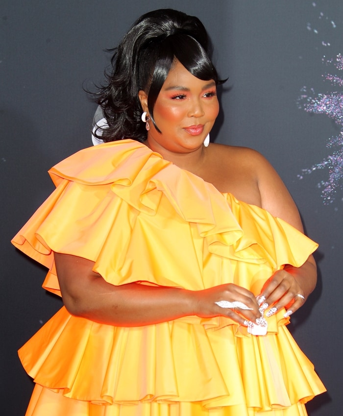 Lizzo's ruffled orange minidress from Valentino