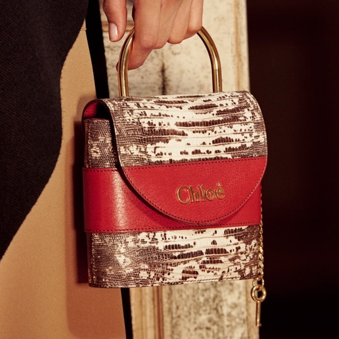 Small Aby Lock chain bag designed in the shape of the iconic padlock featured on the Maison's original Paddington bag