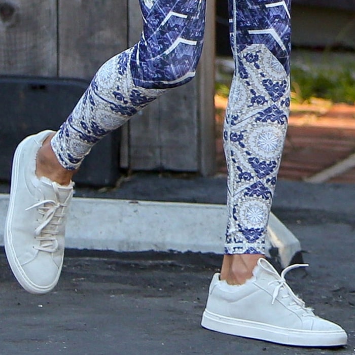 Alessandra Ambrosio wears Common Projects' coveted Retro Low shearling-lined suede sneakers