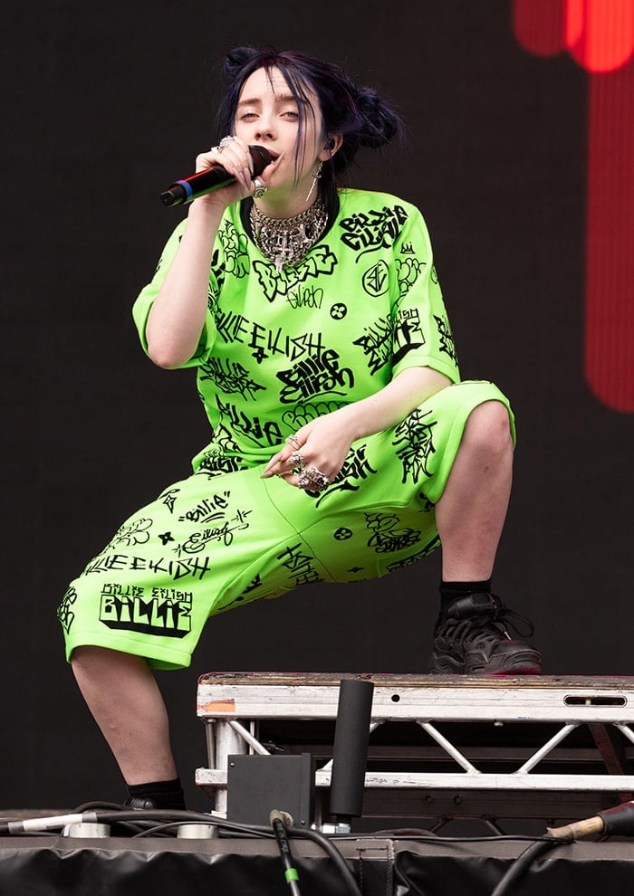 Billie Eilish performs at BBC Radio 1 Big Weekend in custom Freak City graffiti set and Under Armour x ASAP Rocky sneakers on May 25, 2019