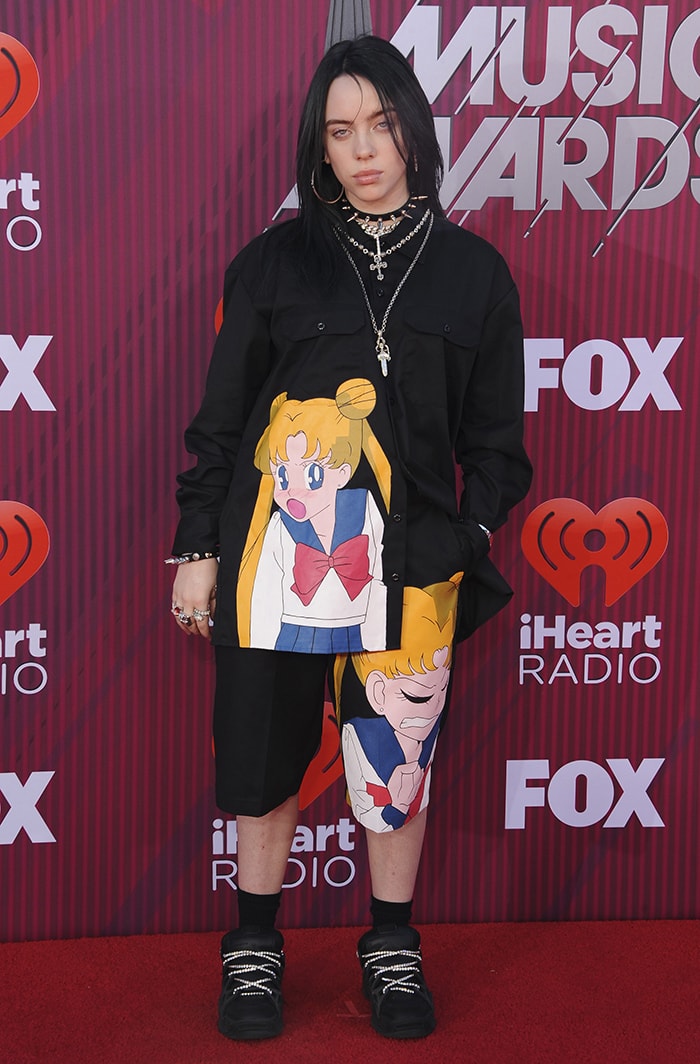 Billie Eilish in a custom Slumpy Kev 'Sailor Moon' outfit and Under Armour x ASAP Rocky SRLo black sneakers