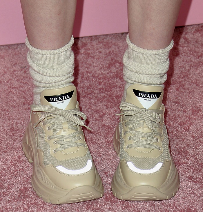 Billie Eilish's Prada chunky sneakers in a subtle quartz-pink hue sitting on a 75mm light rubber tread sole