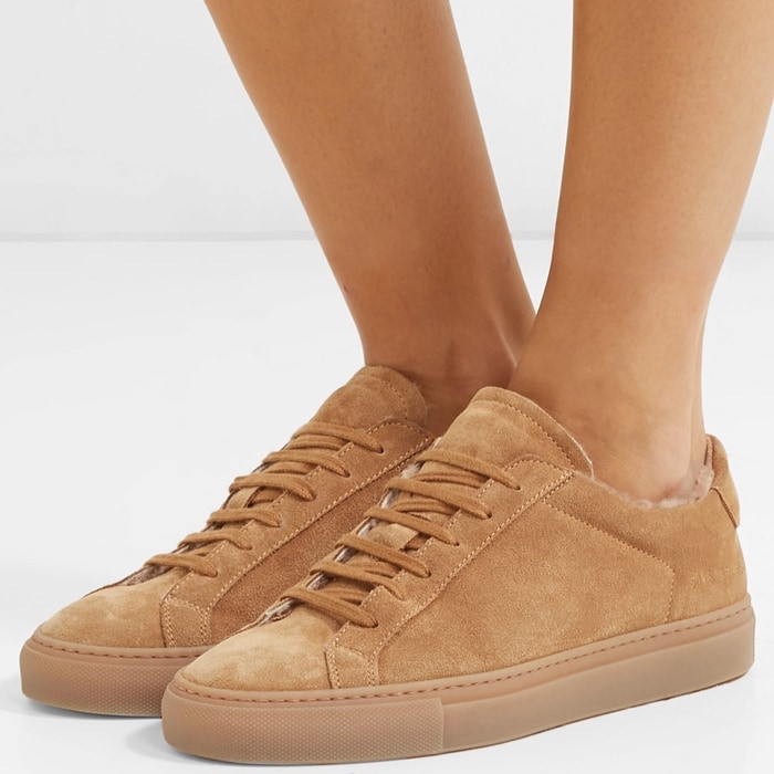 These 'Retro Low' sneakers have been made in Italy from sand suede and stamped with a unique serial number at the heel