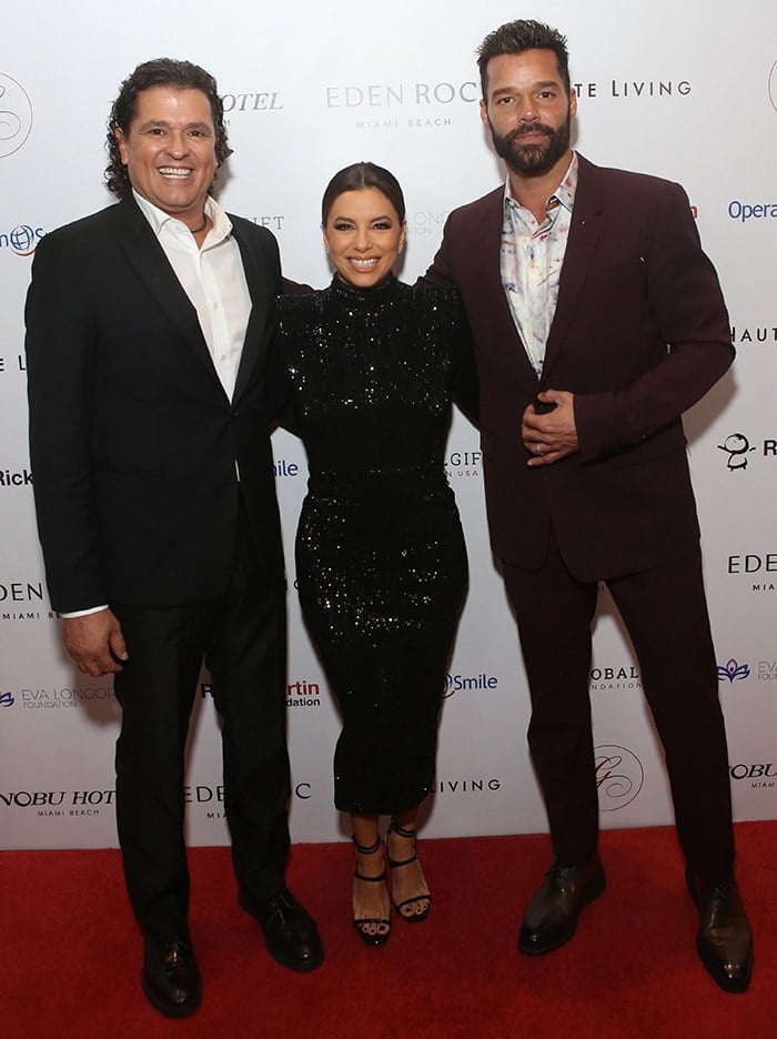 Carlos Vives, Eva Longoria, and Ricky Martin at Global Gift Foundation USA's 2019 Global Gift Gala held at the Eden Roc Hotel during the Art Basel in Miami on December 5, 2019