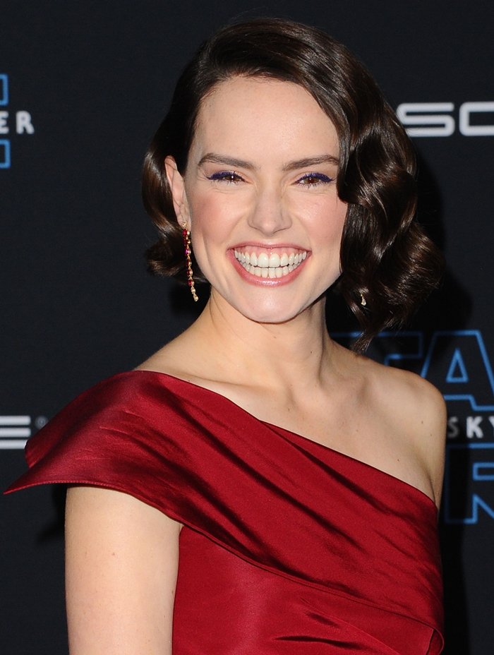 Daisy Ridley's white teeth and Anita Ko ruby and diamond drop rope earrings