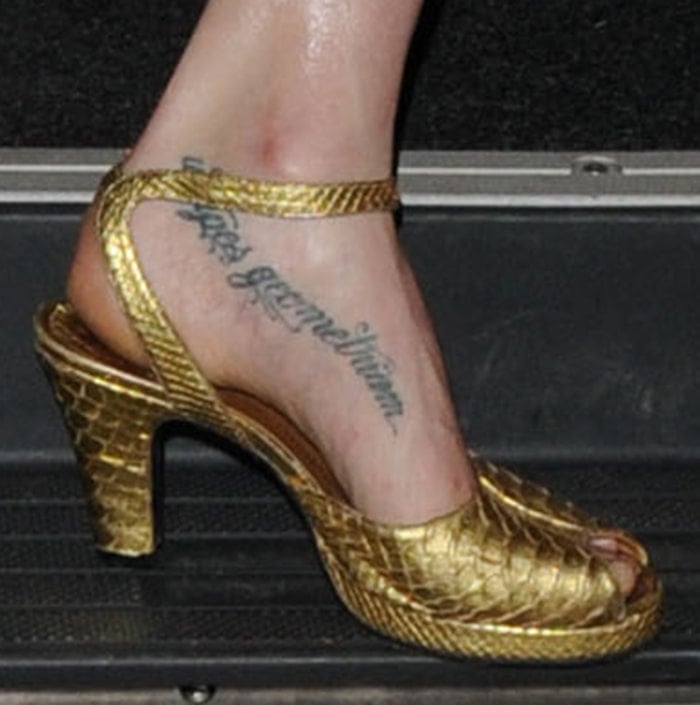 Lily Cole has the Latin phrase “Ut Apes Geometriam” tattooed on the inside of her left foot