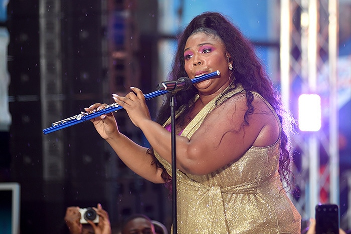 Lizzo plays the flute while performing on NBC Today Show on August 23, 2019