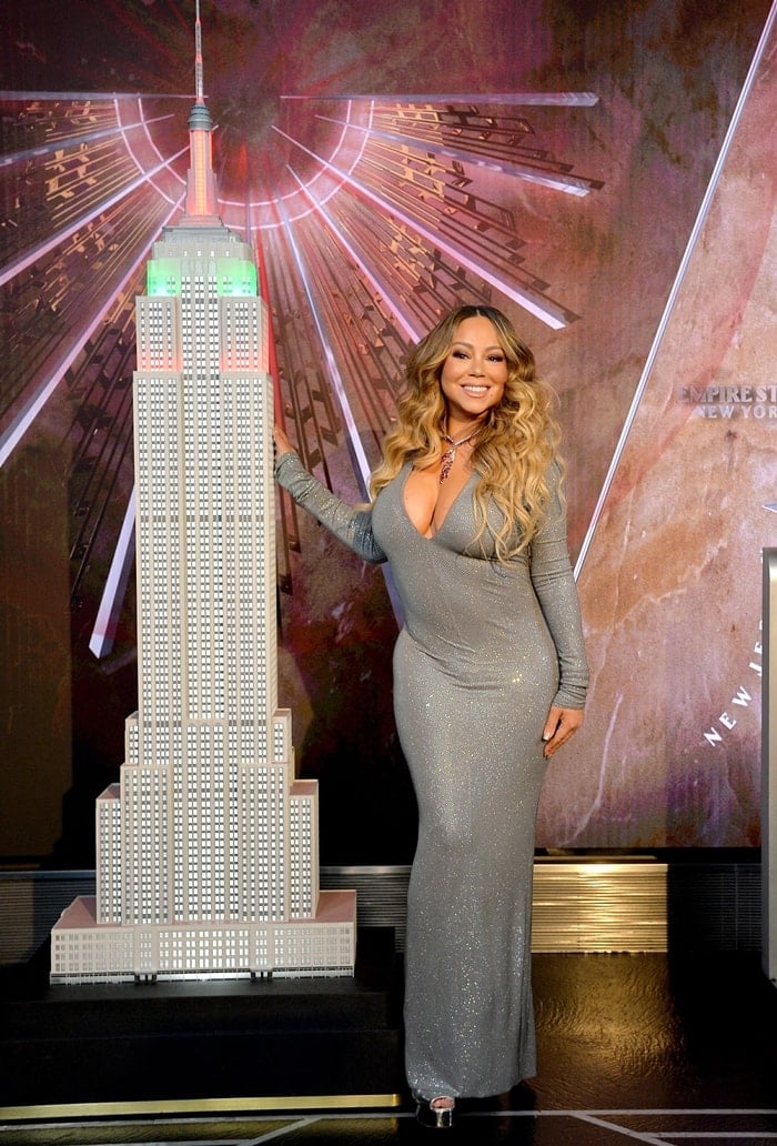 Mariah Carey participates in the ceremonial lighting of the Empire State Building to commemorate the 25th anniversary of the release of her single "All I Want For Christmas Is You"