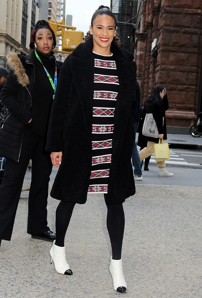 Paula Patton in Chanel tweed panel dress and Chanel two-tone ankle boots outside the AOL Build studio in New York City on December 18, 2019