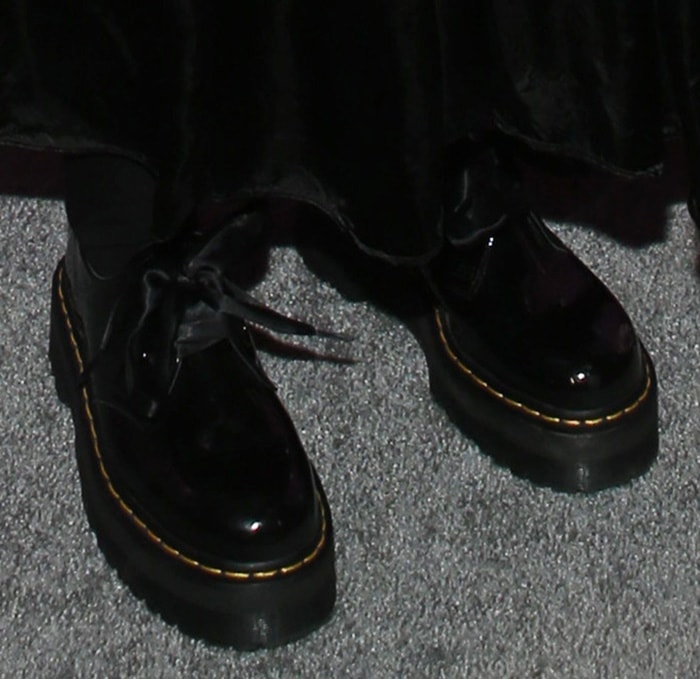 Tove Lo completes her gothic-chic ensemble with sleek Dr. Martens 'Holly' platform shoes