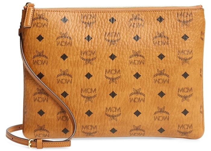 A signature logo print adds impeccable style to a streamlined cognac pouch furnished with an optional crossbody strap