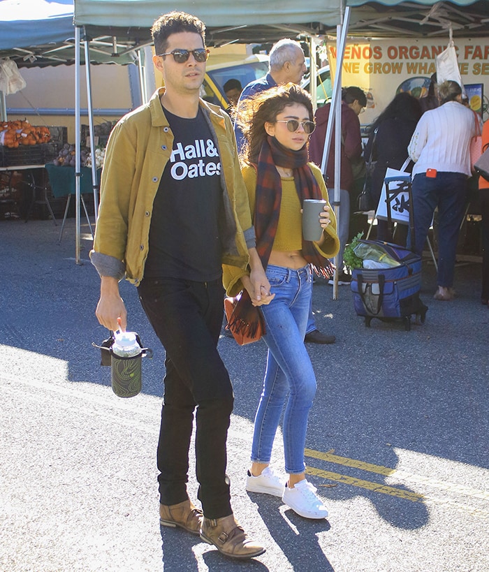 Sarah Hyland and Wells Adams in matching mustard yellow top