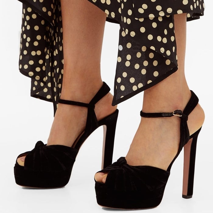 Look to Aquazzura’s black Evita platform sandals for truly confident glamour