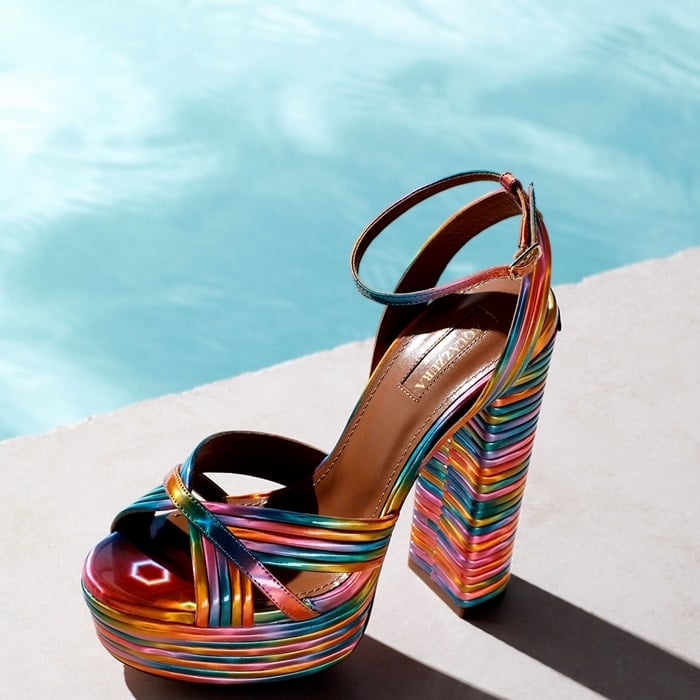 In a whimsical ombré-style rainbow finish, these sky-high platform sandals exude 70s-inspired charm