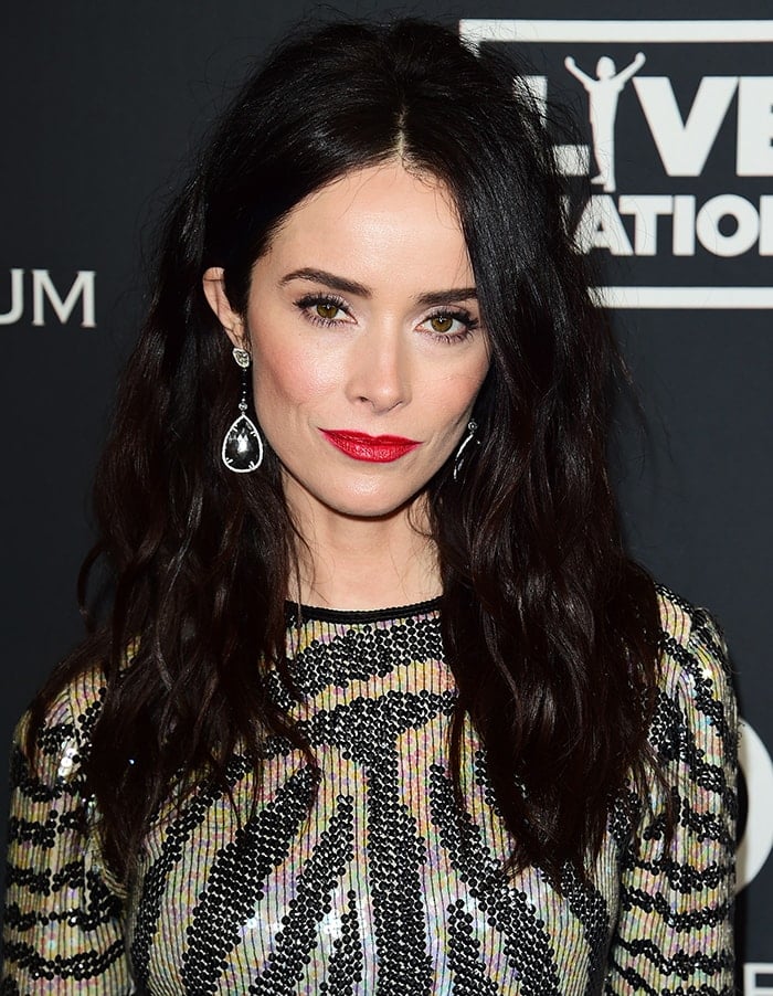 Abigail Spencer amps up her fierce look with tousled waves and red lipstick