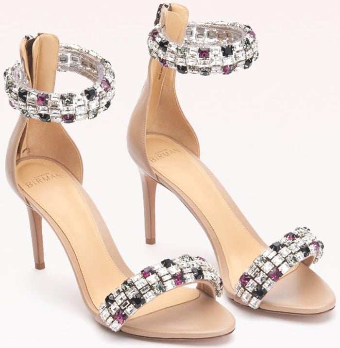 Colorful Swarovski crystals shine on this sandal, meticulously crafted from smooth leather with a back zipper