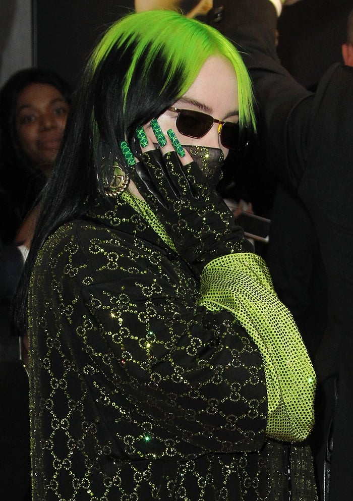 Billie Eilish has her nails painted in Gucci monogram