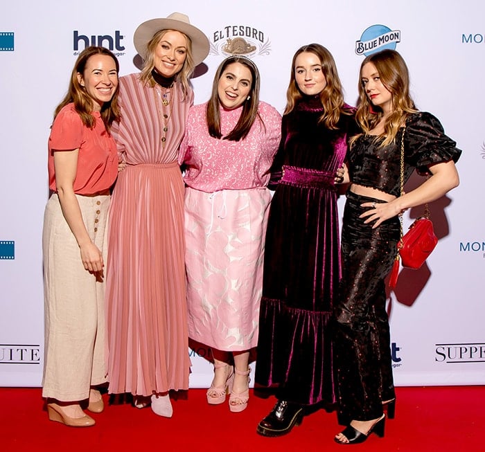 Katie Silberman, Olivia Wilde, Beanie Feldstein, Kaitlyn Dever, and Billie Lourd showcase their distinct styles at the 2019 SXSW Film Festival, pairing elegant dresses with chic footwear—from heeled sandals to statement boots—on March 9, 2019
