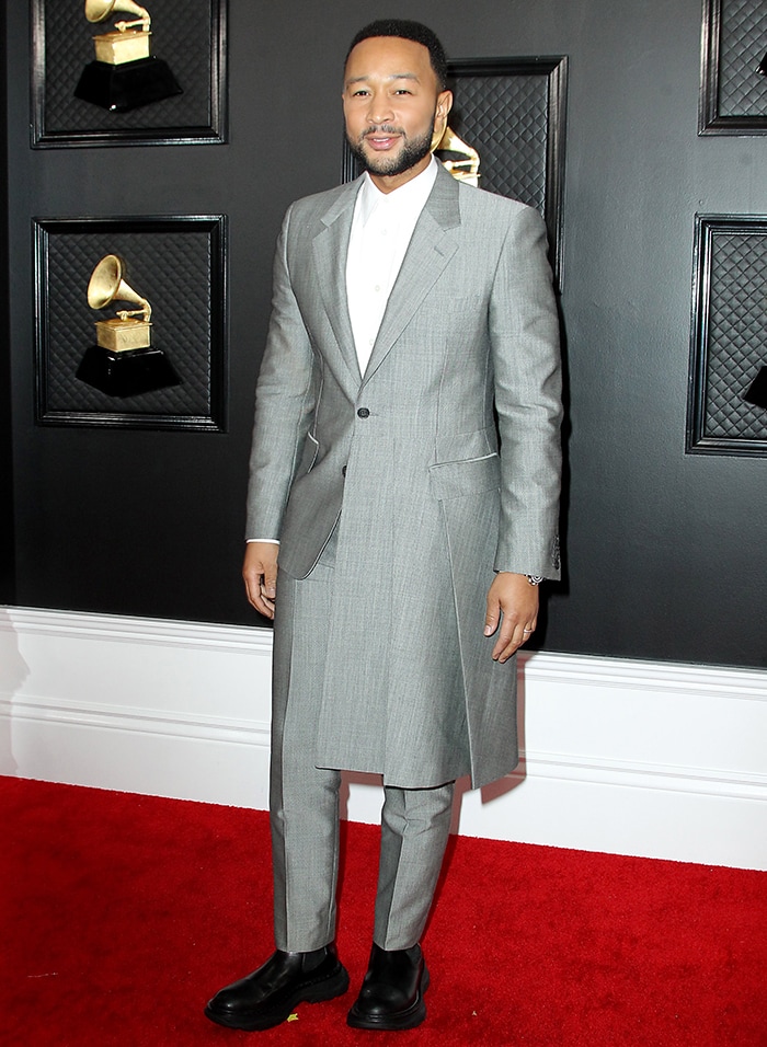 John Legend wears asymmetric Alexander McQueen gray suit