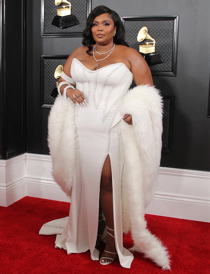 Lizzo channels old Hollywood vibe in a custom white Versace gown