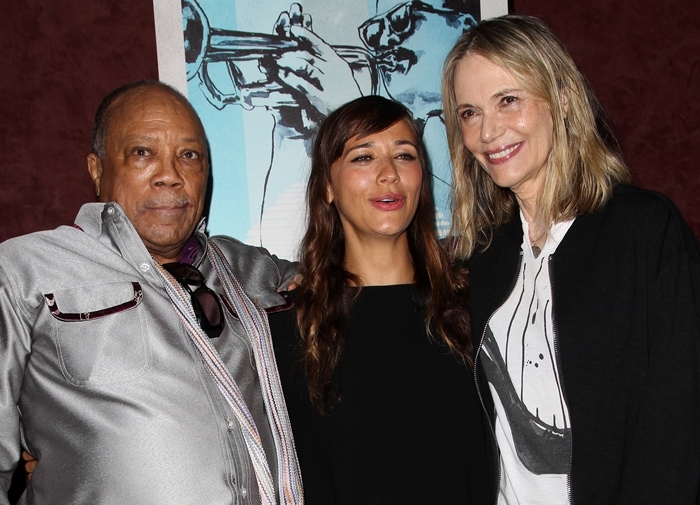 Rashida Jones poses with her parents, the late actress Peggy Lipton and music legend Quincy Jones