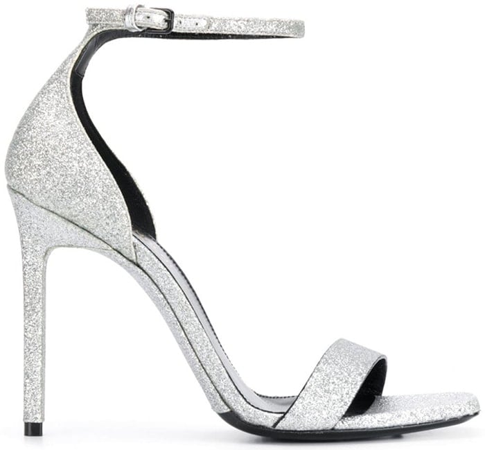 Silver-tone leather Amber 105 sandals from Saint Laurent featuring an open toe, a buckle fastening, a branded insole, glitter details and a mid high stiletto heel