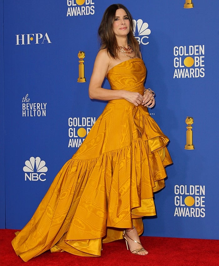 Sandra Bullock skipped the red carpet arrival but posed for photos in the press room following the ceremony