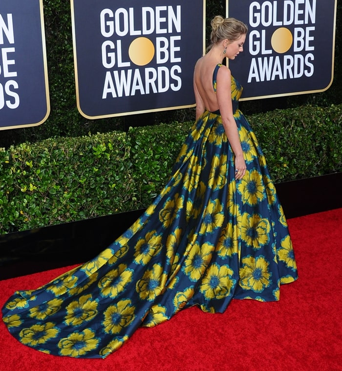 Taylor Swift's high heels could not be seen due to the length of her Etro navy silk jacquard floral print ball gown