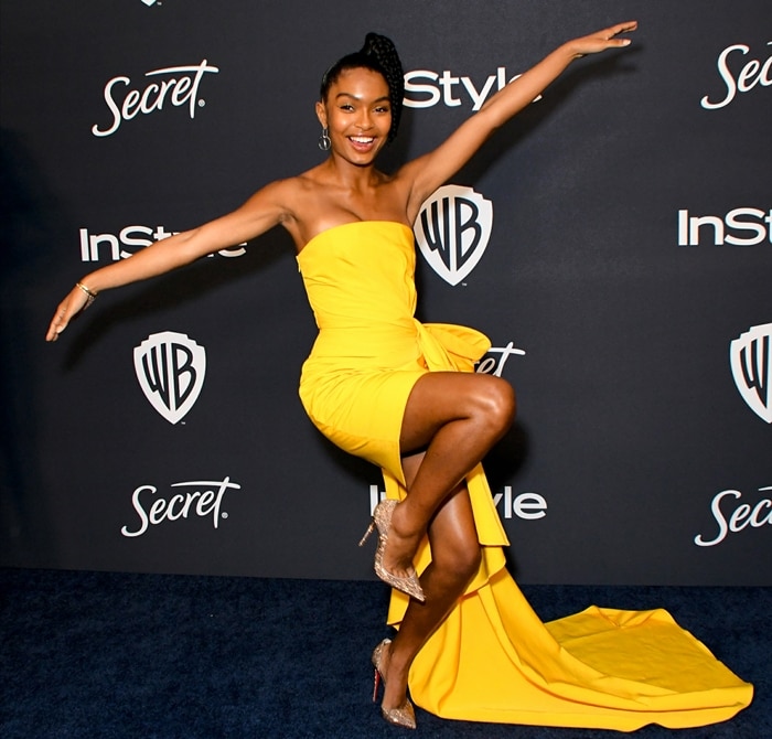 Yara Shahidi flaunts her legs in Christian Louboutin pumps